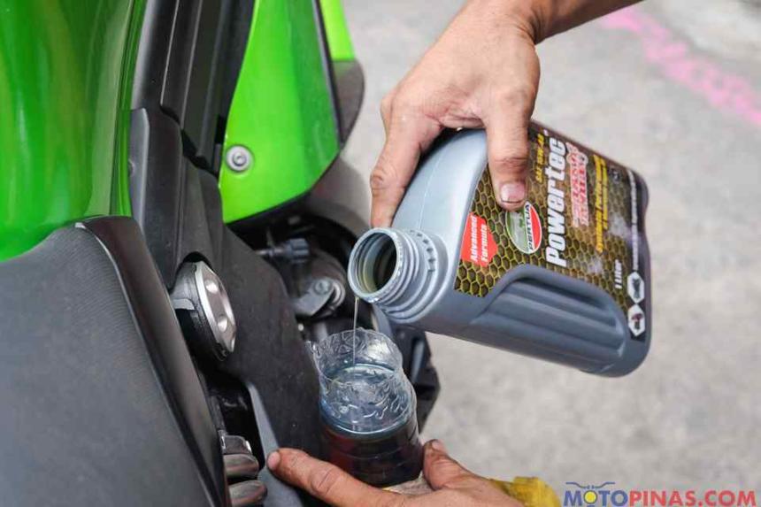 How to: Flush oil and other fluids from a flooded motorcycle image