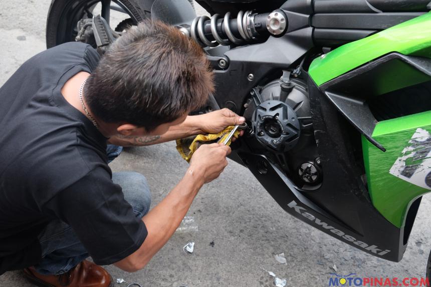 How to: Flush oil and other fluids from a flooded motorcycle image