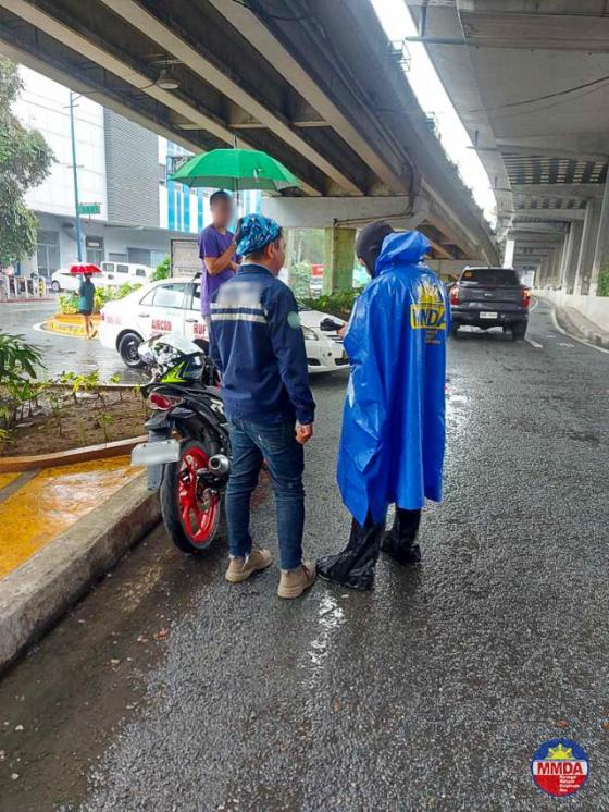 MMDA tickets riders who shelter under flyovers, footbridges MMDA tickets riders who shelter under flyovers, footbridges image