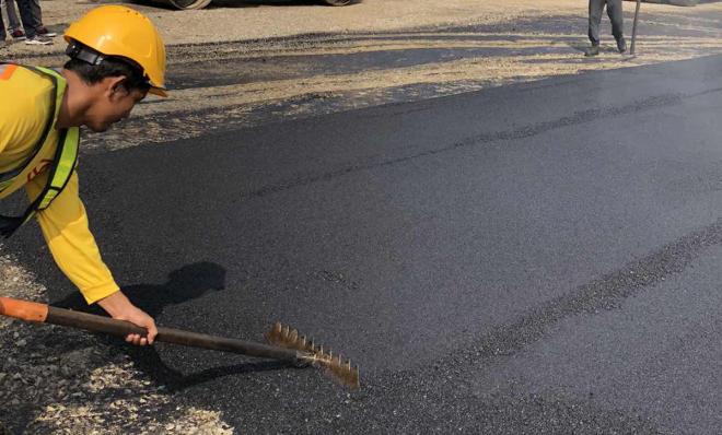 Big PH company builts a road from recycled plastics image