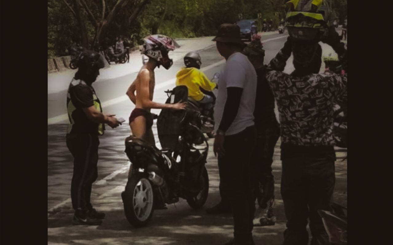 'Naked rider' caught, authorities revisiting attire rule