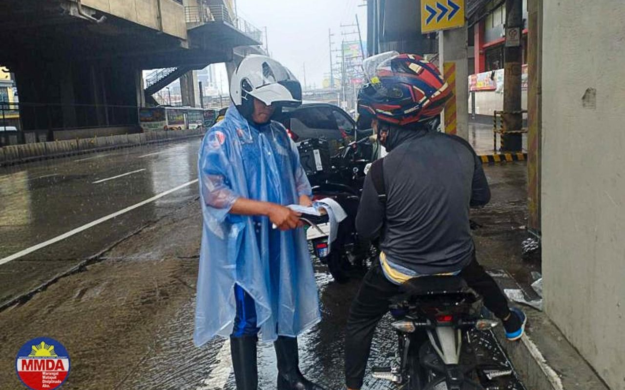 MMDA tickets riders who shelter under flyovers, footbridges