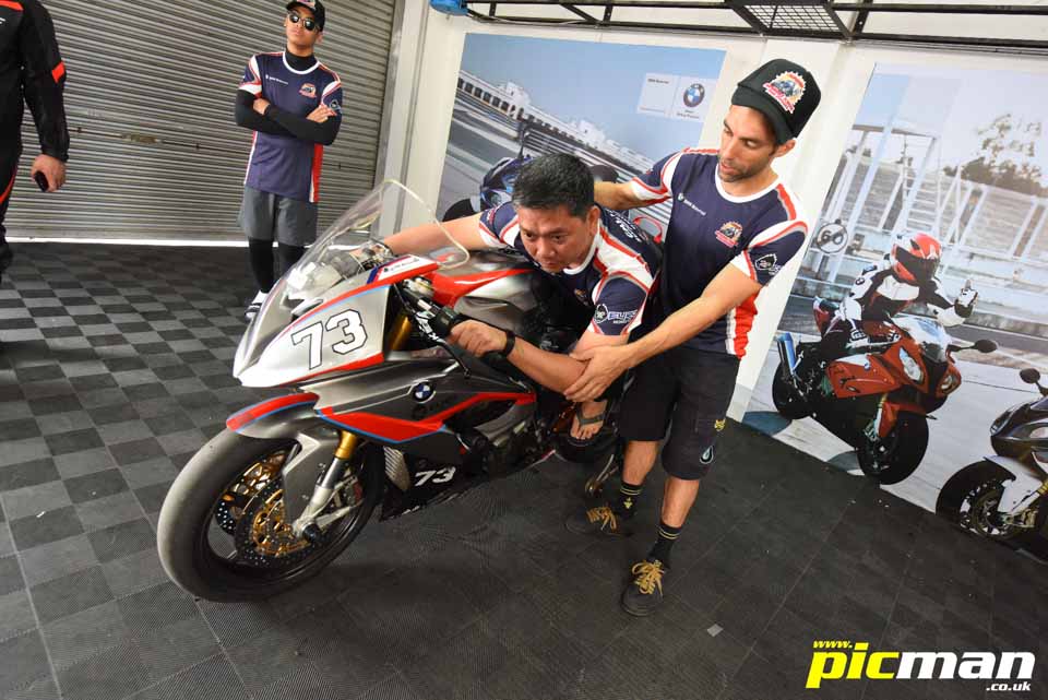 Fixing that phobia of corners An instructor shows BMW Motorrad's Gil Balderas the proper body position for cornering