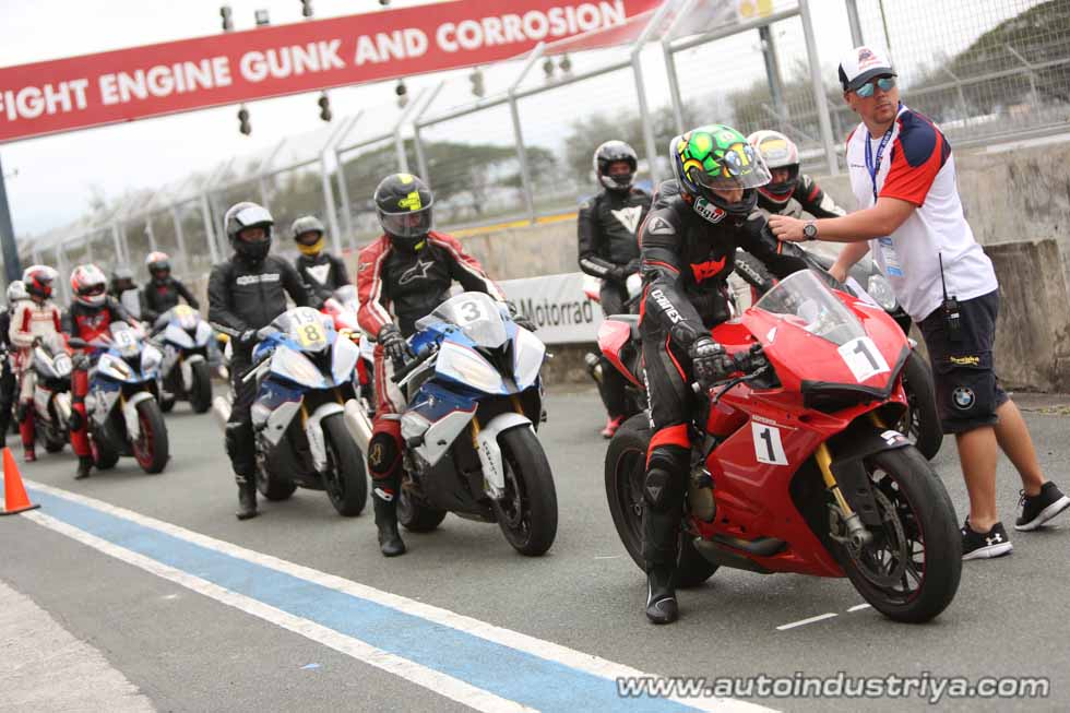 Students line up before their track session.