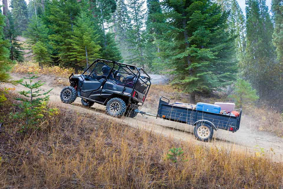 The 2017 Honda Pioneer 1000 LE towing a trailer